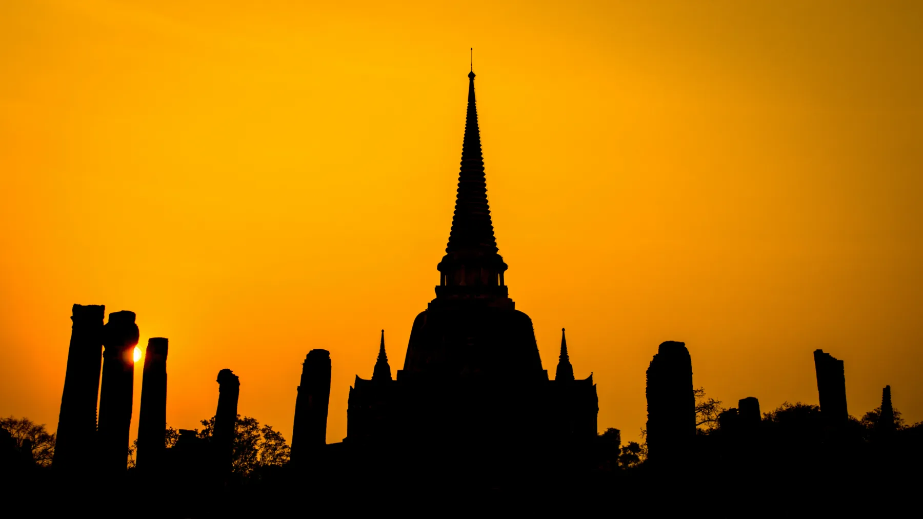 Ayutthaya temple silhouette at sunset