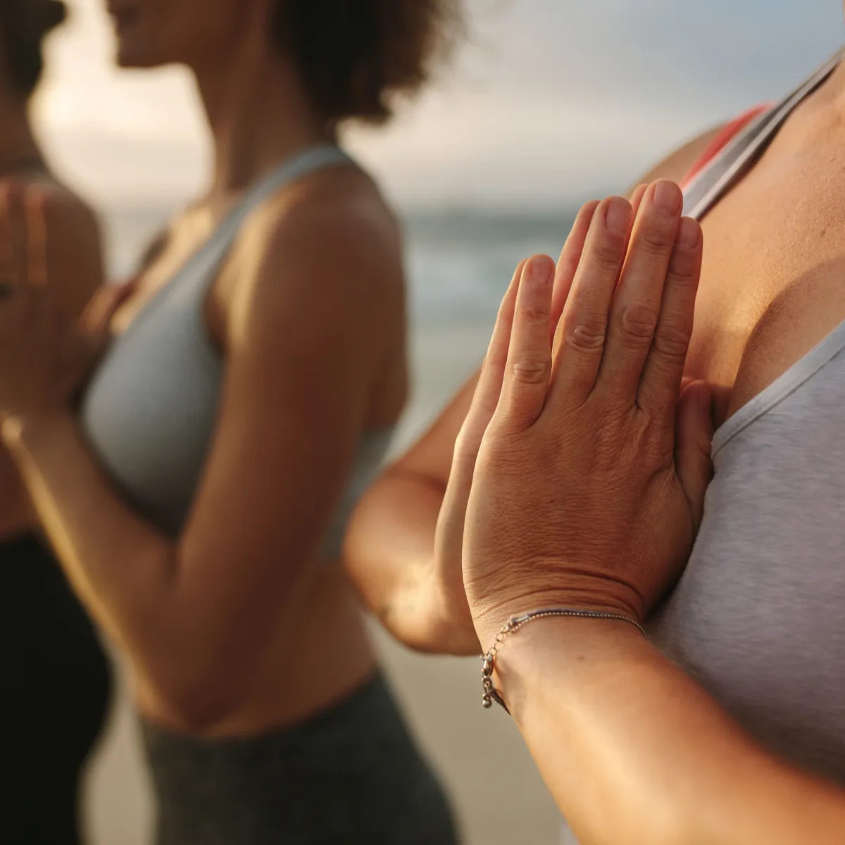 Gentle group yoga near the sea