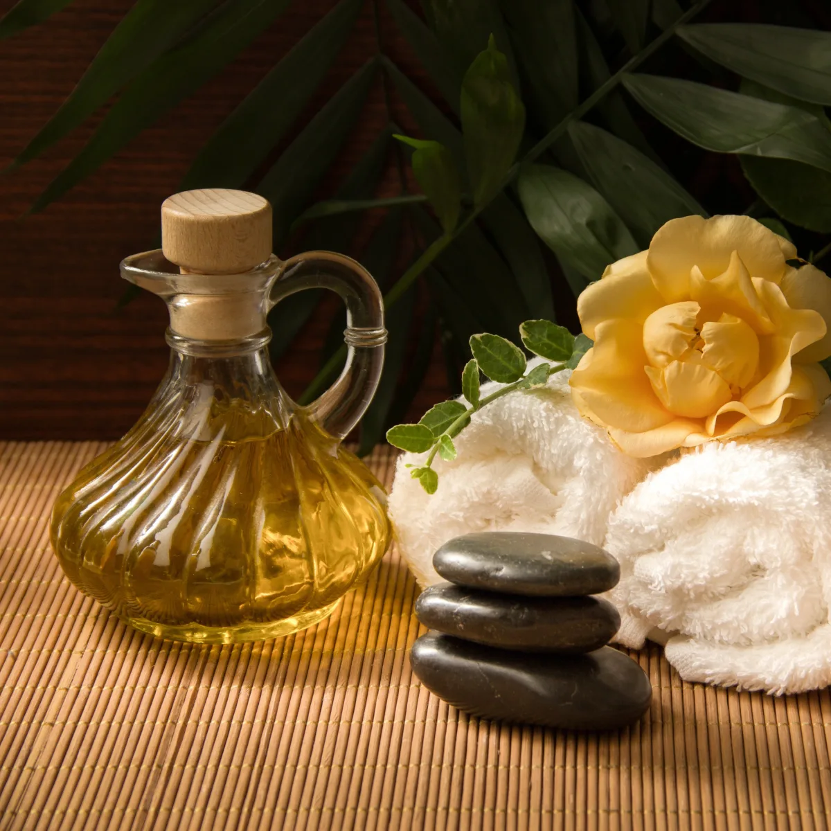 Spa oils, towels, and warm stones
